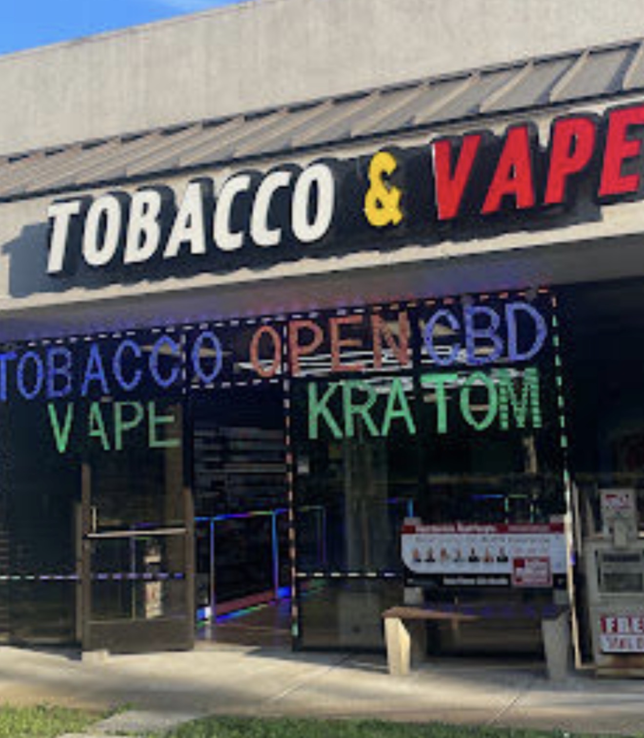Vape shop storefront with kratom products